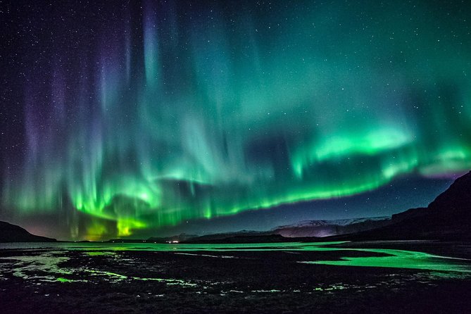 Chasing Aurora Borealis with Warmth and Treats in Premium Tour! - Reykjavik’s glow vs. dark sky: the core aurora advantage