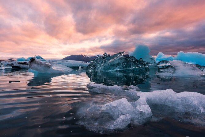 Diamond Beach & Jökulsárlón Floating Glacier Guided Day Tour - Diamond Beach: black sand and ice diamonds up close