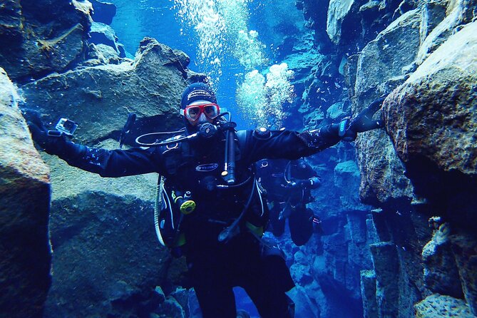 Dive the Divide: Silfra Fissure Scuba Tour | Meet at Thingvellir - The pre-water routine at Silfra: ladder, platform, and checks
