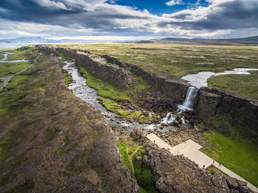 From Reykjavik: Golden Circle & Secret Lagoon Day Tour - Faxi, Geysir, and Strokkur: when the ground turns theatrical