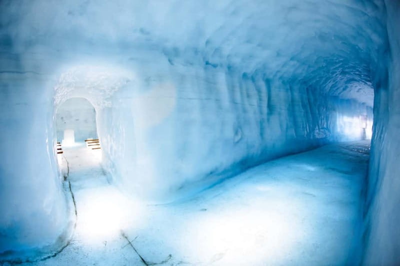 From Reykjavik: Into the Glacier Ice Cave Tour - Staying warm: crampons, waterproof layers, and weather