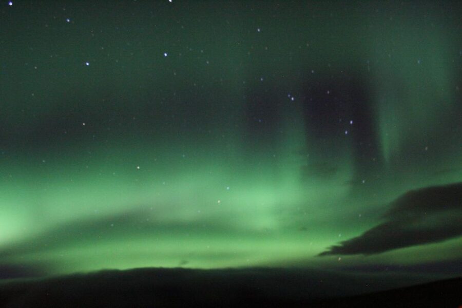 From Reykjavik: Northern Lights Boat Cruise - Deck vs. cabins: how the warm overalls change your experience
