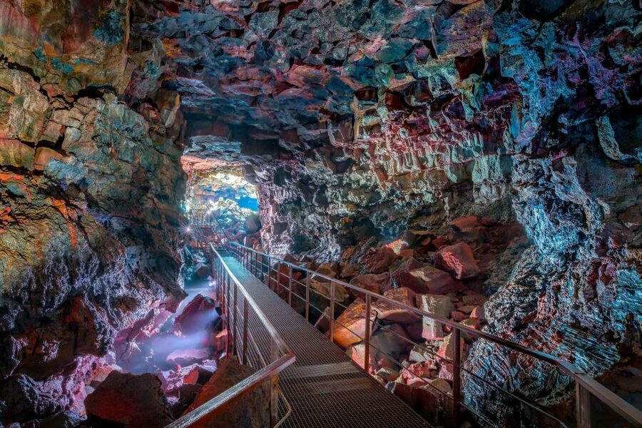 From Reykjavik: Raufarhólshellir Lava Tunnel by Bus - Inside the Lava Tube: Columns of Light and Mineral Colors