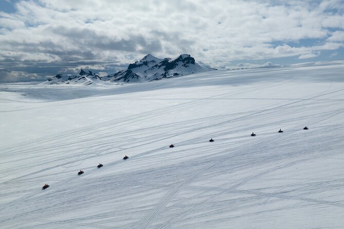 Glacier Snowmobiling and Natural Ice Cave Tour from Reykjavik - Geldingafell staging: the short stop that makes the ride smoother