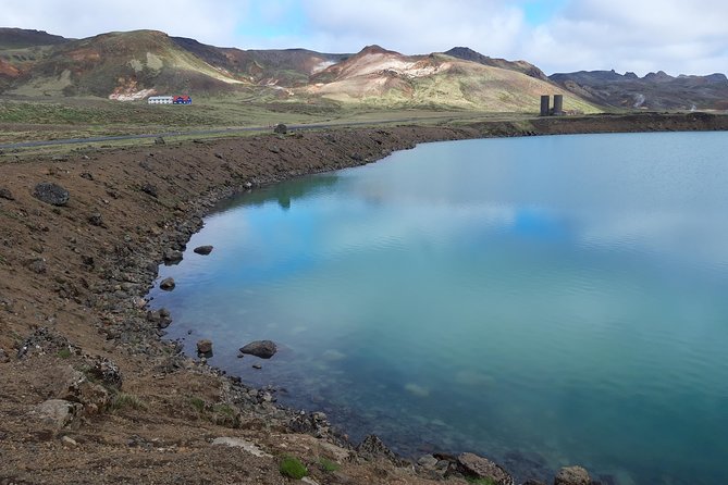 Lava, Craters and Hot Springs Private Tour - Stop 1 to 3: memorial gravity, coastal lighthouse views, and a quiet stone church