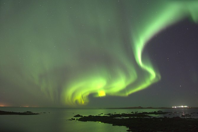 Northern Lights Cruise from Downtown Reykjavik - Heated cabin, outdoor viewing decks, and the overalls you’ll want