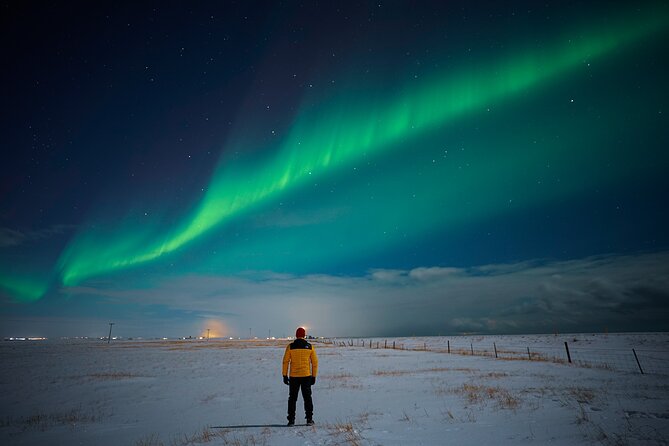Northern Lights Tour with Photos, Snacks, Warm Snowsuits, Chairs - What the guide does in the dark: passion, patience, and lots of photo checking