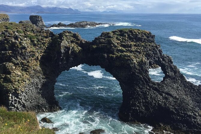 Private Snæfellsnes Peninsula day tour with 6+ Attractions - Lóndrangar Basalt Cliffs: Ocean-Carved Ruins and Birdwatching Chances