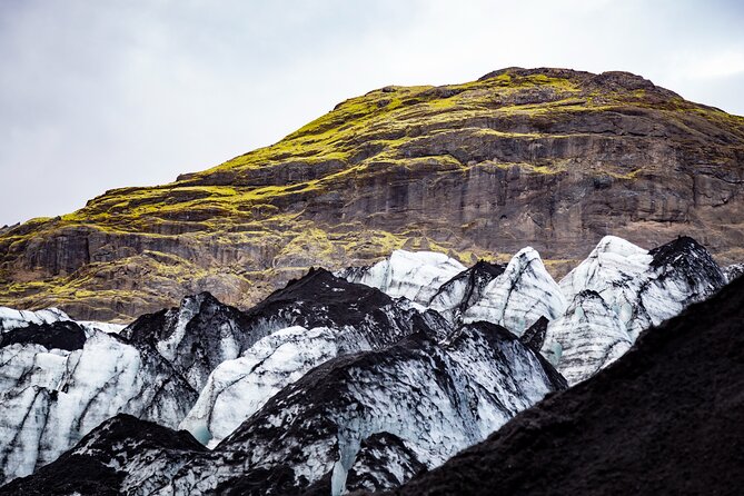 Private South Coast Fire and Ice: Glacier viewpoint & Lava Show - Reynisfjara black sand: dramatic coastline time (and a chance for wildlife)