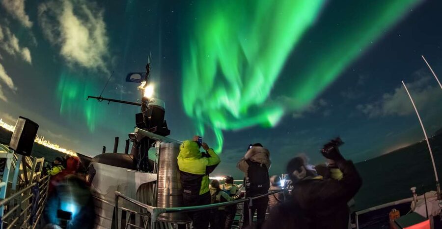 Reykjavik: 2-Hour Northern Lights by Boat with Backup Plan - Your guide, the onboard setup, and staying comfortable while you wait