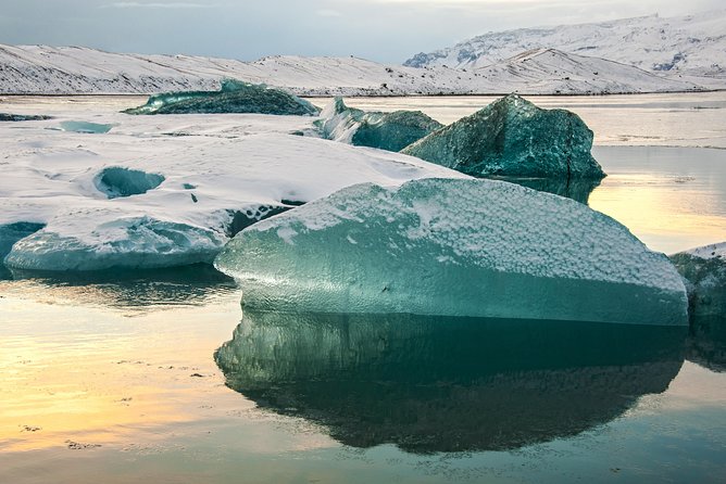 Reykjavik: Glacier Lagoon Boat Ride & South Coast Full Day Tour - Diamond Beach black sand and ice: short time, huge impact