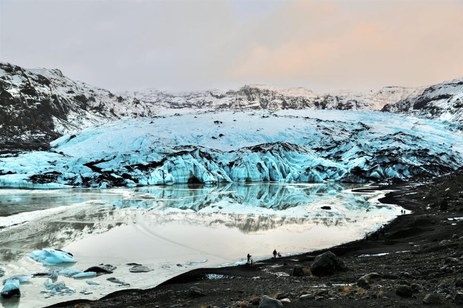 Reykjavík: South Coast Waterfalls, Black Sand & Glacier Tour - Seljalandsfoss: the walk behind the waterfall, and why waterproof gear matters