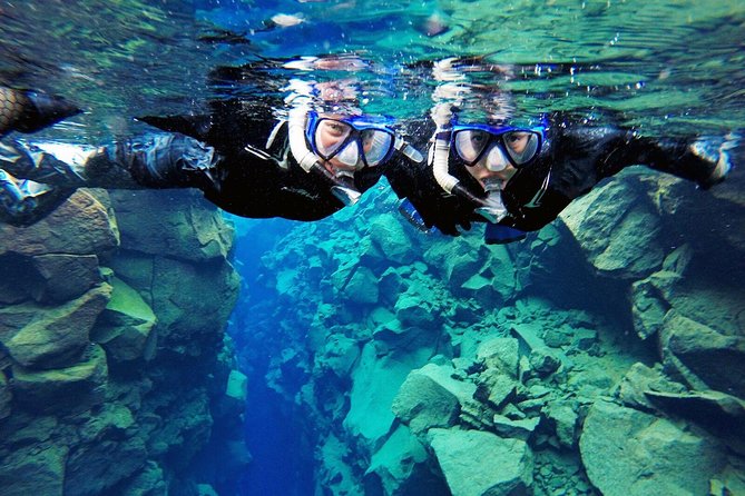 Silfra Drysuit Snorkeling Tour with Free Photos - From Reykjavik - Drysuit vs wetsuit: choosing warmth and comfort that fit your body