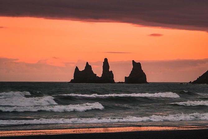 South Coast Day Tour Black Sand Beach & Waterfalls from Reykjavik - Stop 2: Skogafoss Stairs, Eyjafjallajökull Views, and Quick-Strike Photography