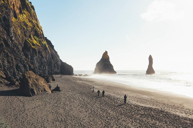 South Coast Day Tour Black Sand Beach & Waterfalls from Reykjavik - Stop 4: Solheimajökull Glacier Walk and Touching Ice Up Close