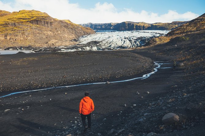 South Coast Day Tour Black Sand Beach & Waterfalls from Reykjavik - What You Pay Covers: Free Attractions, Guide Value, and the Stuff to Bring