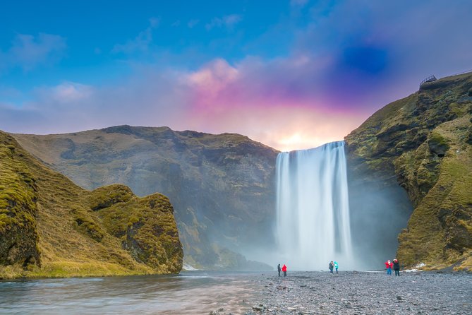 South Coast Iceland from Reykjavik with Guide & Touchscreen Audio - Skógafoss: stairs, double viewpoints, and the kind of roar you feel