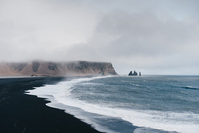 South Coast, Waterfalls and Black Sand Beach (Small Group Tour) - Stop One: Skogafoss and the 60-Meter Waterfall Moment